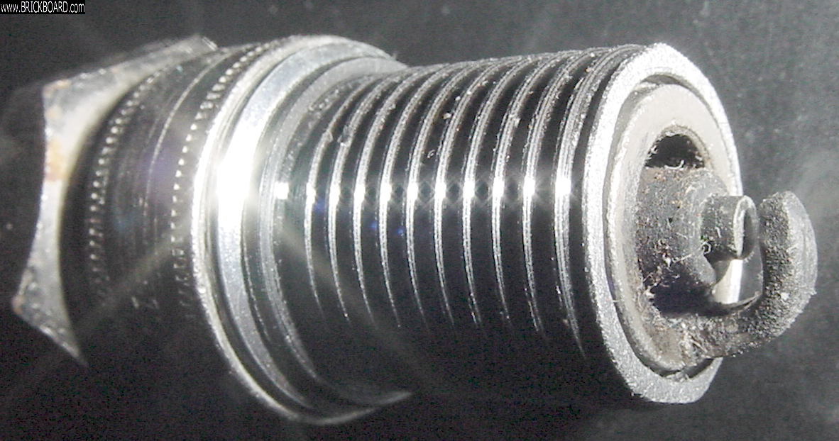 Volvo -- Volvo 240 Spark Plug Thread Sleeve. Even Shorter.