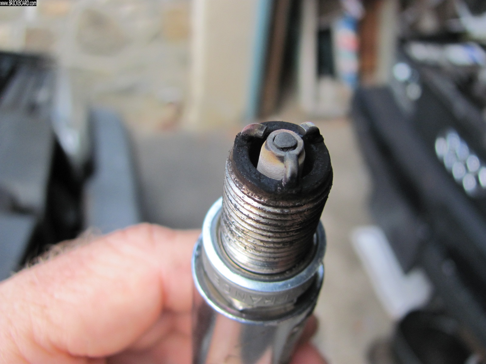Volvo 850 -- 850 plug after 28,600 miles.